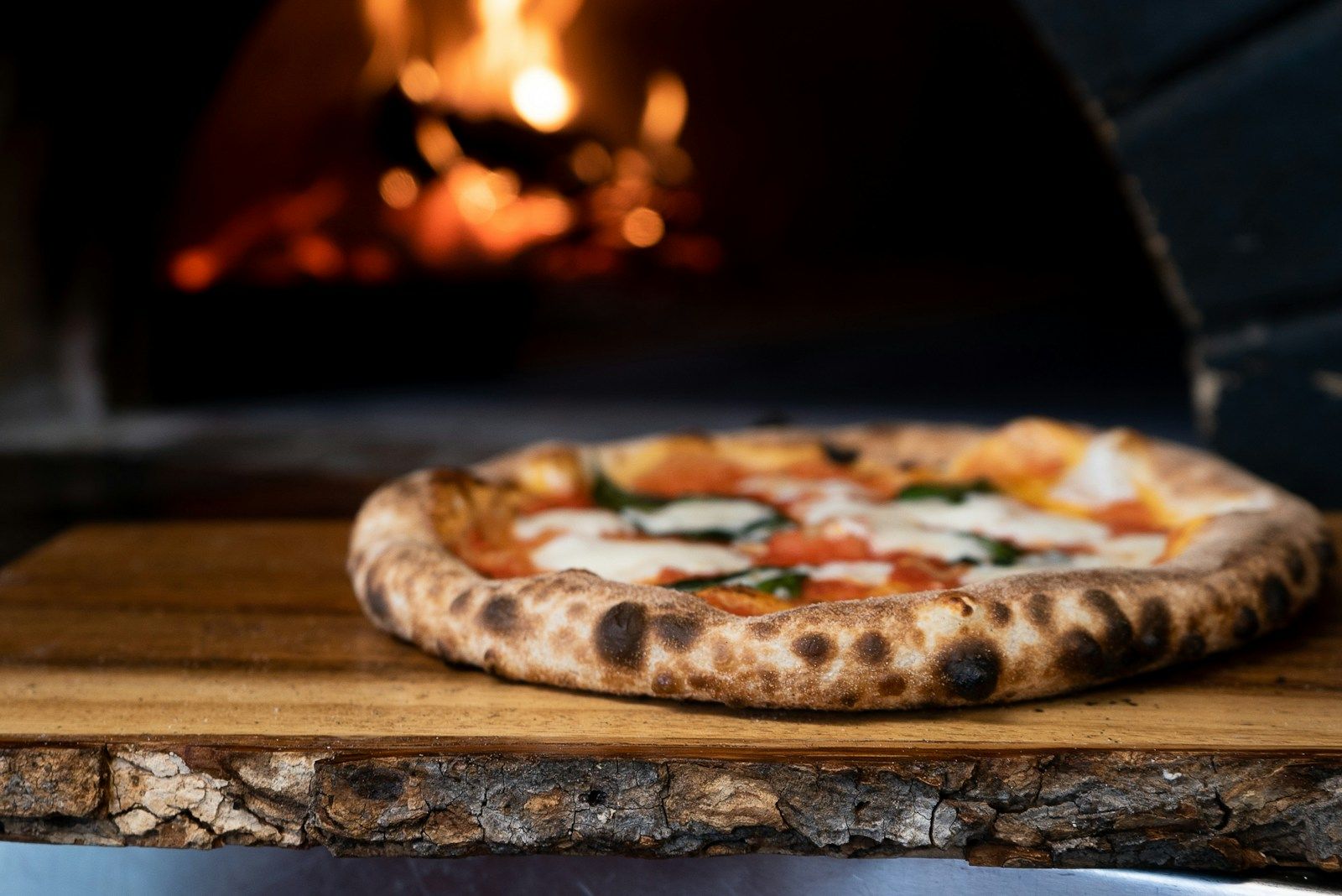 Neapolitan pizza on a rustic wooden table